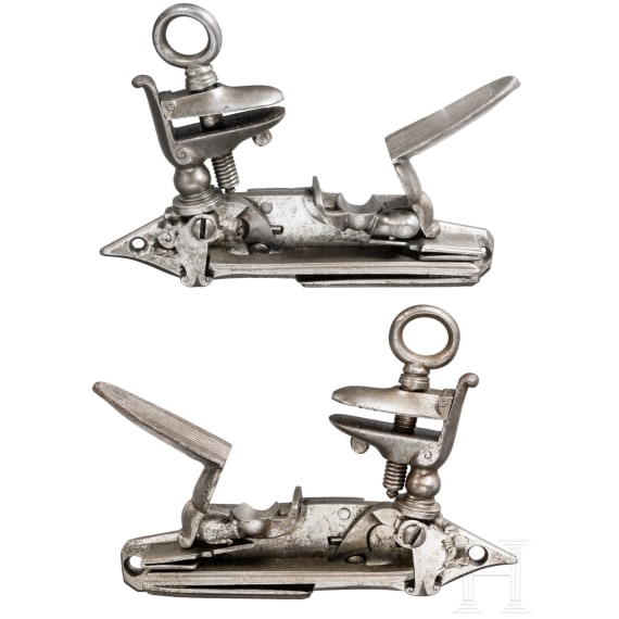 A pair of Spanish Miquelet-type flintlock mechanisms for a double-barrel gun, circa 1800