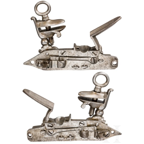 A pair of Spanish Miquelet-type flintlock mechanisms for a double-barrel gun, circa 1800