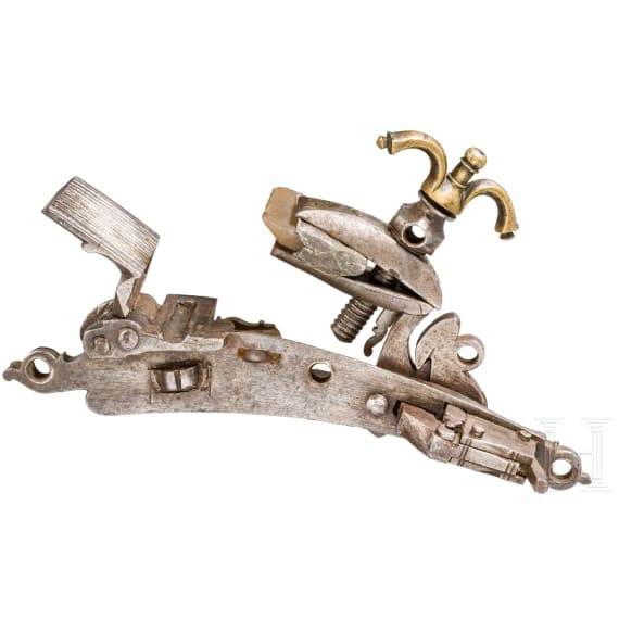 A brass-inlaid Miquelet flintlock, Algeria, early 19th century