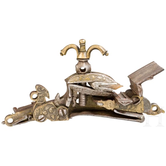 A brass-inlaid Miquelet flintlock, Algeria, early 19th century