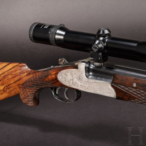 A Ferlach over-and-under rifle with Zeiss scope