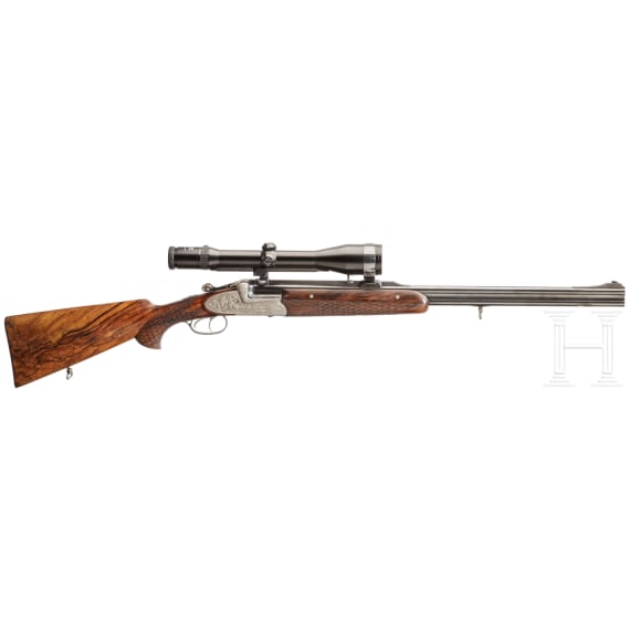 A Ferlach over-and-under rifle with Zeiss scope