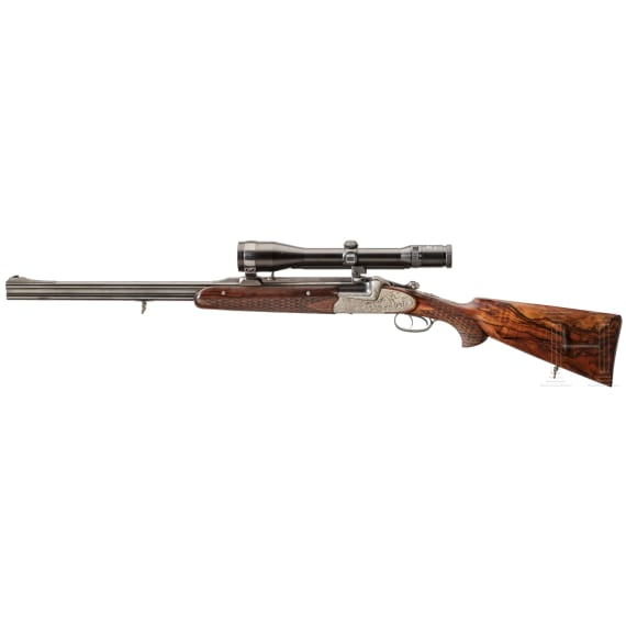 A Ferlach over-and-under rifle with Zeiss scope