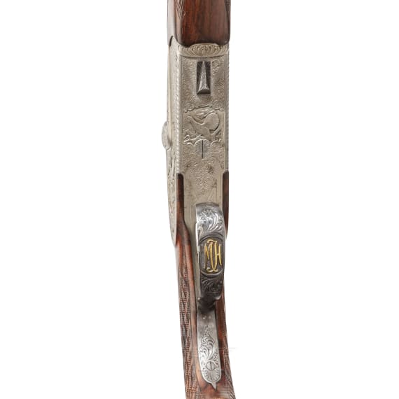 A Ferlach over-and-under rifle with Zeiss scope