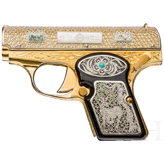 A cased Norinco M 84 in gold finish