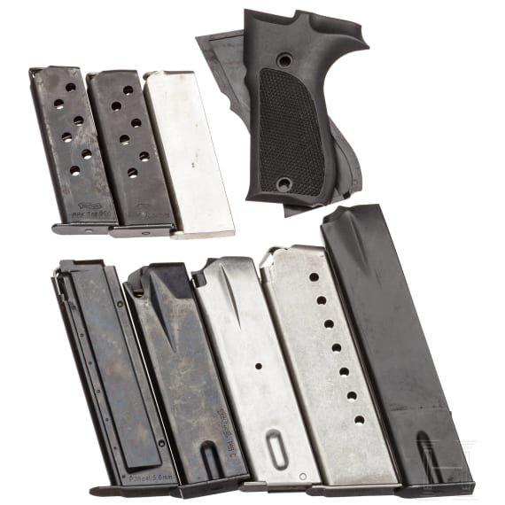 Mixed lot of eight magazines and grips