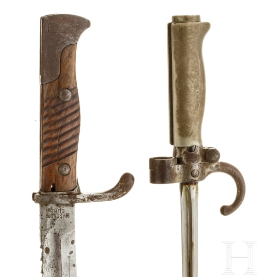 A German sidearm M 98/05 with saw back, and a French bayonet