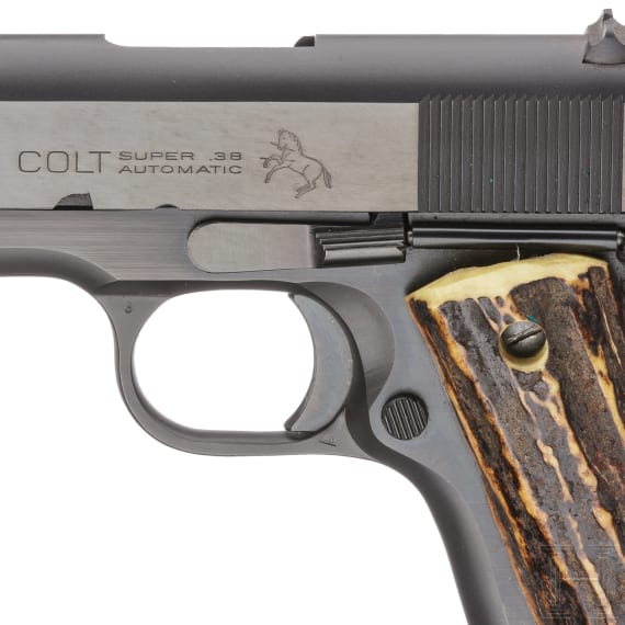 A Colt Super .38 Automatic Model, with holster