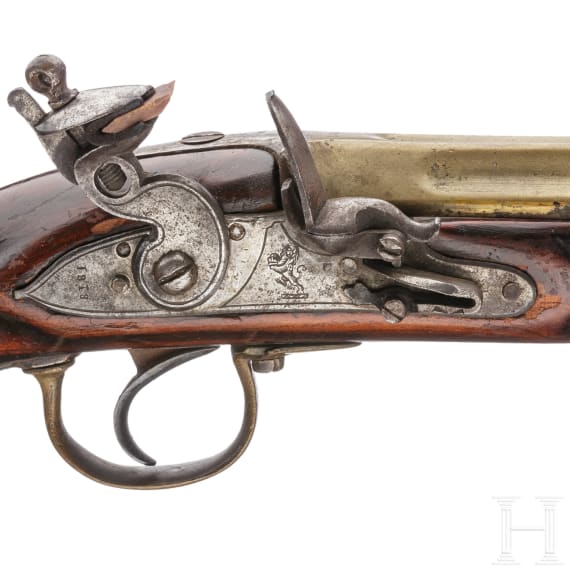 A seven-barrelled flintlock pistol, England, dated 1818
