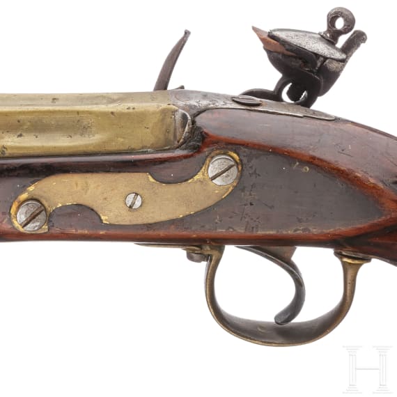 A seven-barrelled flintlock pistol, England, dated 1818