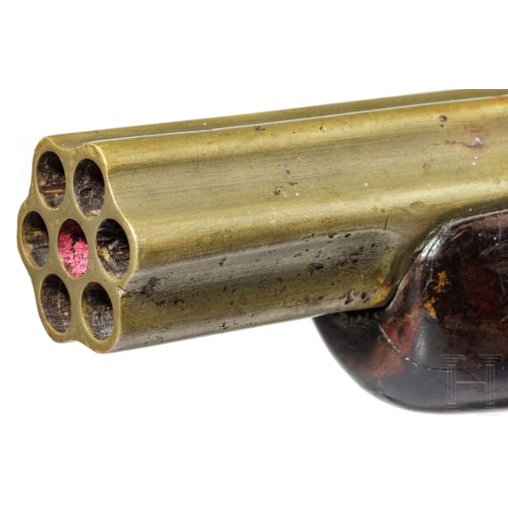 A seven-barrelled flintlock pistol, England, dated 1818