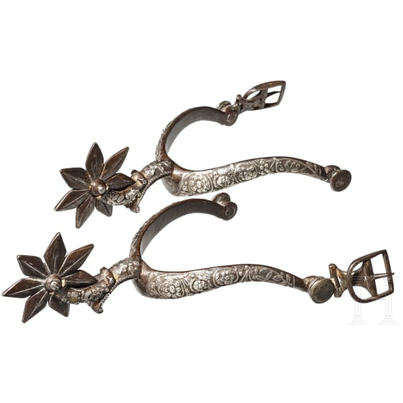 A pair of German/French silver-inlaid spurs, 17th century