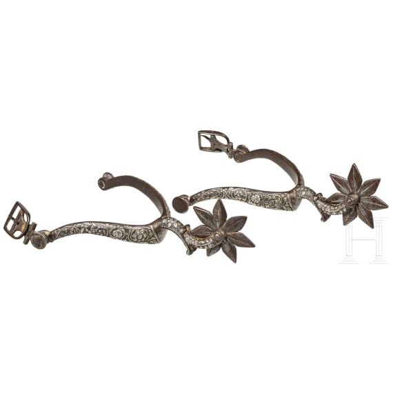 A pair of German/French silver-inlaid spurs, 17th century