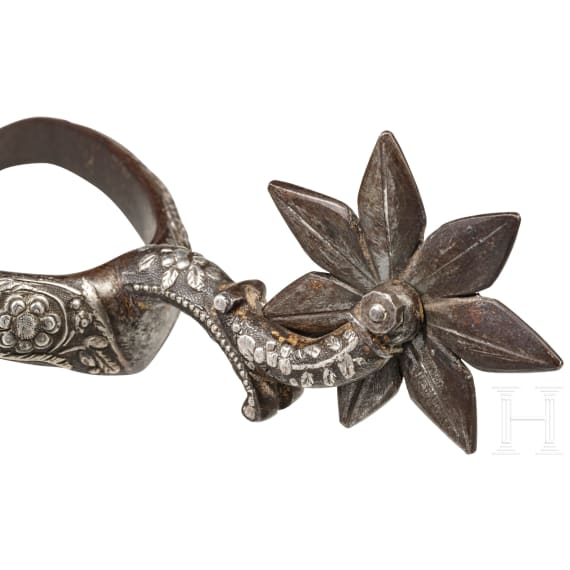 A pair of German/French silver-inlaid spurs, 17th century
