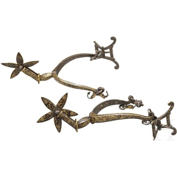 A pair of French or English gold-inlaid spurs, early 17th century