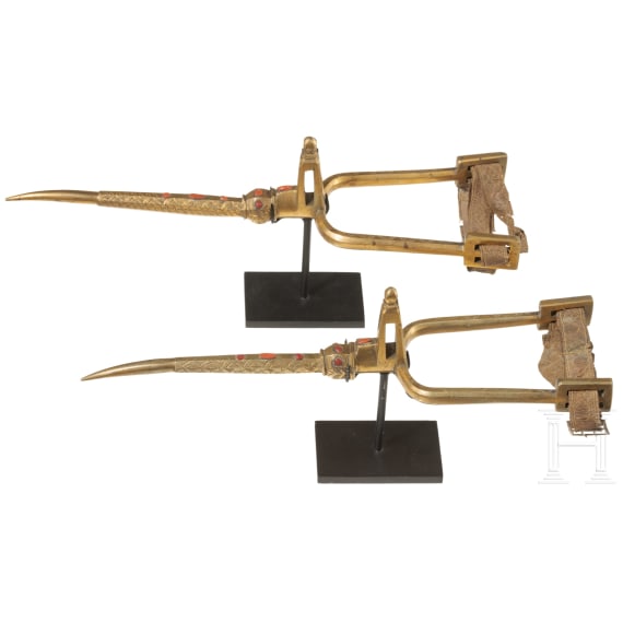 A pair of Algerian fire-gilt and coral-set spurs, 18th century