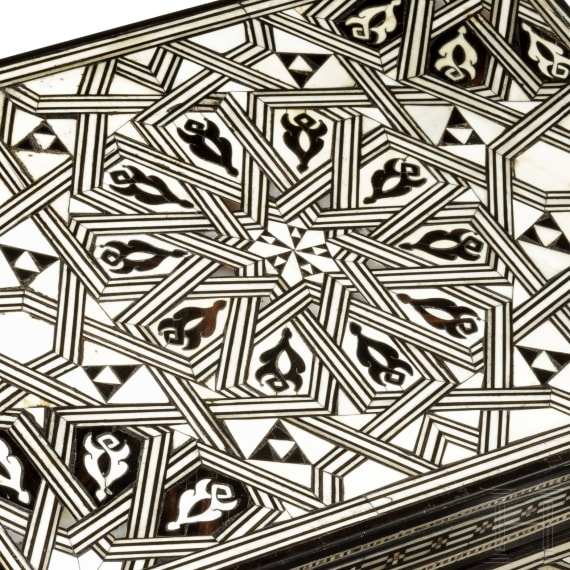 A north African ivory inlaid casket in Mooric style, circa 1900