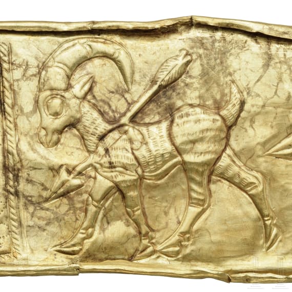 An Iranian gold mount with hunting scene, 2nd millennium B.C.
