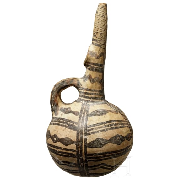 A Greek/Cyprian Helladic spherical bottle with long spout, 2nd millennium B.C.