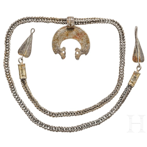 A rare Viking dragon head lunula pendant on necklace, 10th century