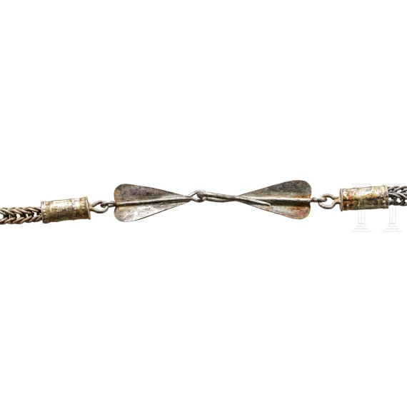 A rare Viking dragon head lunula pendant on necklace, 10th century