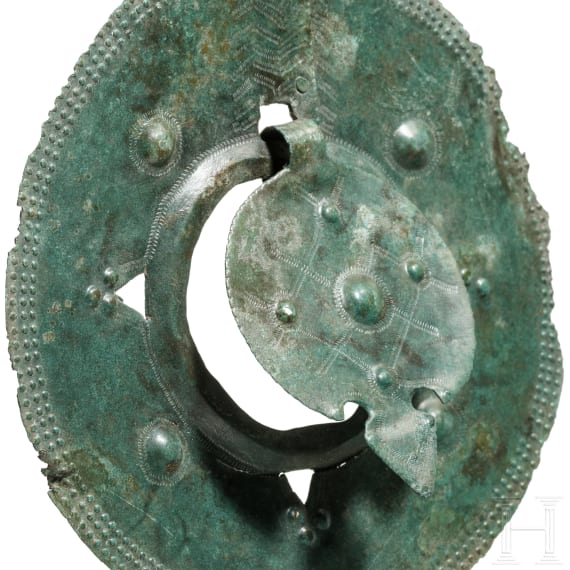 A large Viking bronze disc, 9th - 11th century