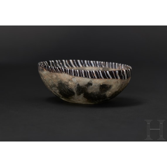 A late Hellenistic/early Roman glass bowl with floral décor in pigment coating between double walls, 1st century B.C. – 1st century A.D.