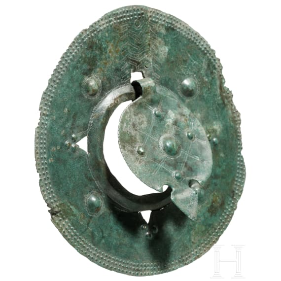 A large Viking bronze disc, 9th - 11th century