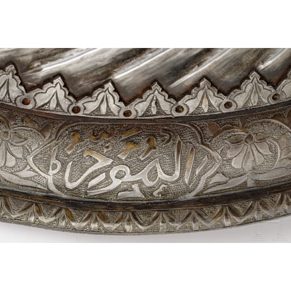 An embossed and carved Indian iron shield, 20th century