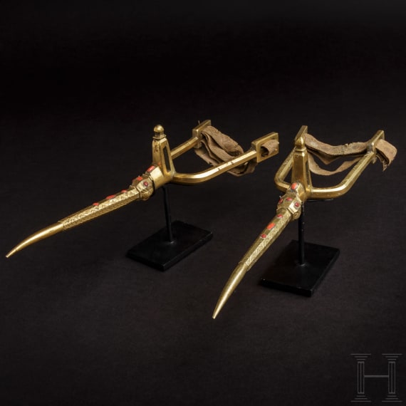 A pair of Algerian fire-gilt and coral-set spurs, 18th century