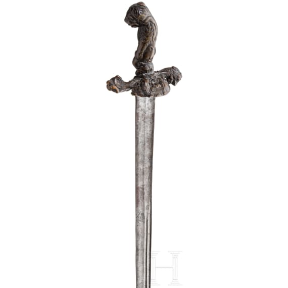 An important German deluxe hunting hanger with handle and guard made of finely carved rhinoceros horn, circa 1680