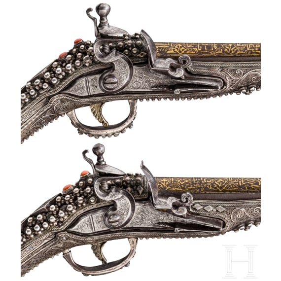 A deluxe pair of Balkan Turkish gold-inlaid and silver-mounted flintlock pistols, 19th century