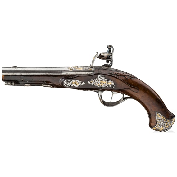 A chiselled flintlock pistol, Liège, 18th century