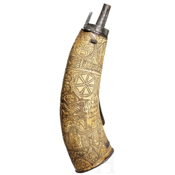An Austrian carved powder flask, dated 1773