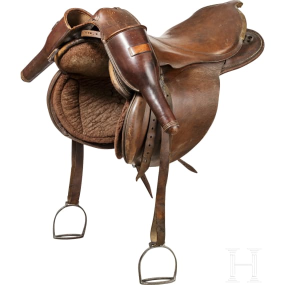 Saddle made of brown leather with pistol holster, 19th century