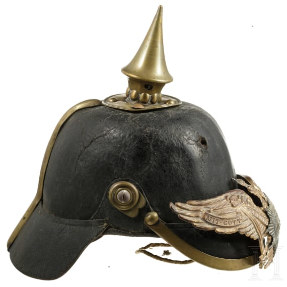Zwei Helmfragmente und zwei Adlerembleme, um 1900