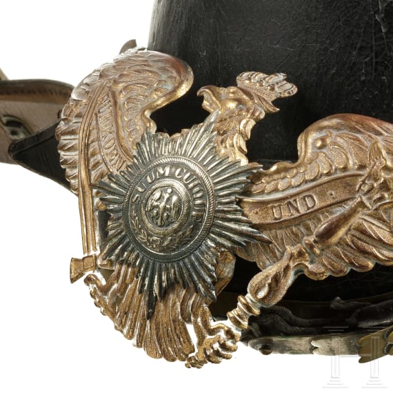 Zwei Helmfragmente und zwei Adlerembleme, um 1900