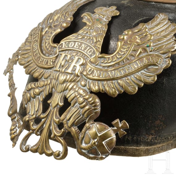 Zwei Helmfragmente und zwei Adlerembleme, um 1900