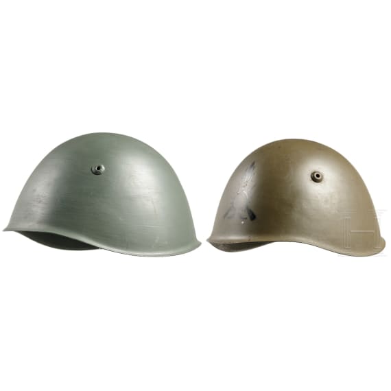 Two Italian steel helmets M 33