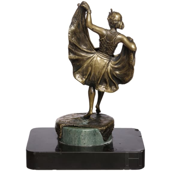 A small bronze sculpture of an amorous dancer, circa 1910/20