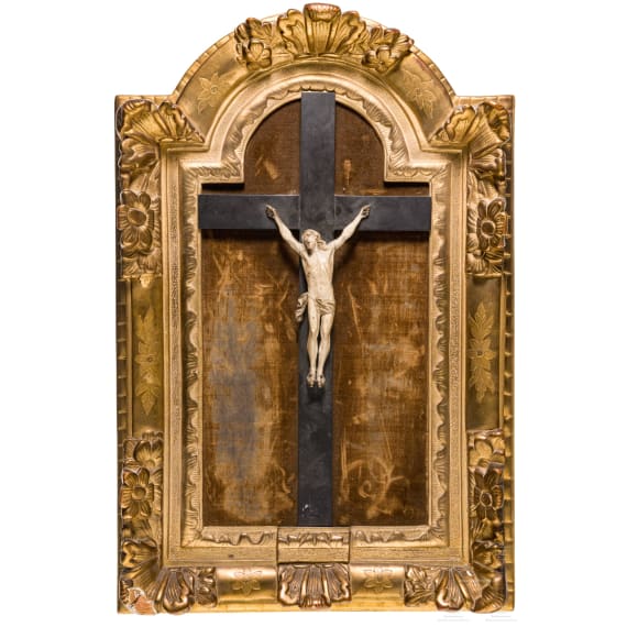 A fine Italian carved body of Christ in baroque frame, 18th century