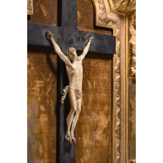 A fine Italian carved body of Christ in baroque frame, 18th century