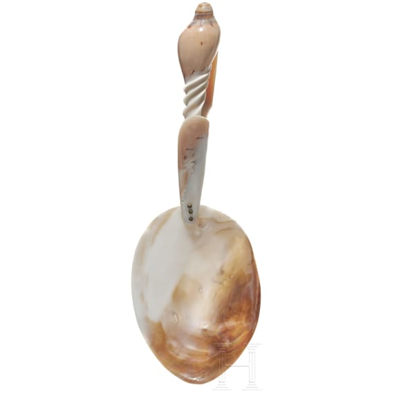 A spoon made from parts of a shell, circa 1900