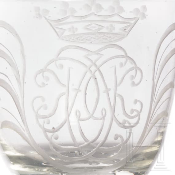 A glass goblet with crowned mirror monogram, circa 1710