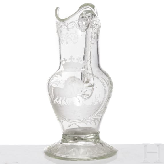 A North Bohemian colourless glass decanter with engraved horses, circa 1800