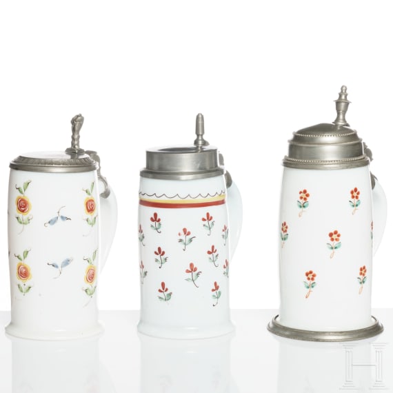 Three German or Bohemian tin-mounted milk glass jugs, circa 1800