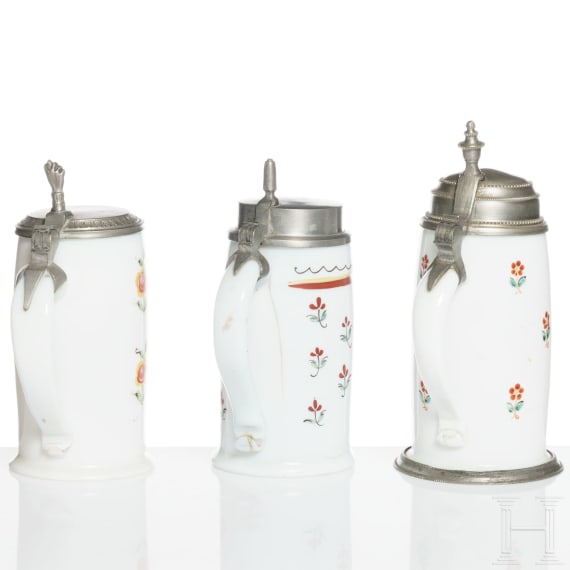 Three German or Bohemian tin-mounted milk glass jugs, circa 1800