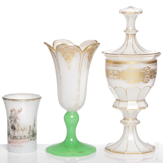 A Bohemian milk glass goblet with cover, beaker and vase, 19th century