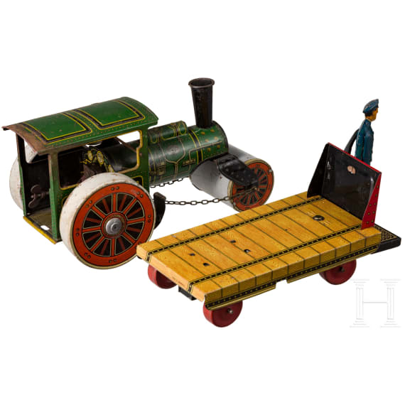 Kleine TippCo-Straßenwalze und Dienstmann mit Rollwagen, im Originalkarton mit Etikett vom Kaufhaus August Stukenbrok