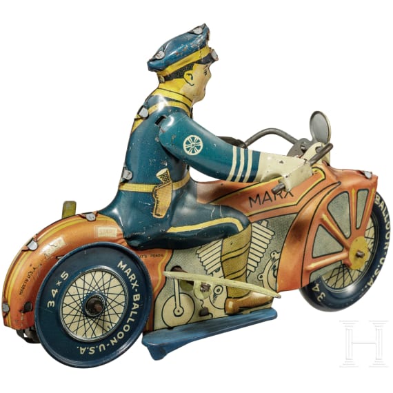 Polizei-Motorradfahrer von Marx Toys mit Aufziehschl&uuml;ssel